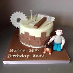 a birthday cake with a man and dog on it