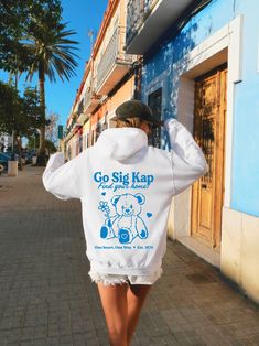 Soft, cute, and trendy, this Sigma Kappa Teddy Bear sorority hoodie will quickly become your go-to cozy sweatshirt! Rep your sorority or purchase as a gift to match with your sisters! Use the drop down to specify preference between white, black, sand, sport grey, dark chocolate, light blue, or light pink.  LISTING IS FOR SIGMA KAPPA. Please be sure you are ordering for your correct Sorority.  We print on high quality, soft, & heavyweight materials, sustainably made and printed in the US. ♥ SIZING ♥ Unisex Sizing- For a more feminine, fitted look we recommend getting your size. For a more oversized look, we recommend sizing up. ♥ SHIP TIME ♥ Items may take up to 7 business days to process before shipping. Shipping time is (on average) an ADDITIONAL 2-5 business days. Shipping times vary for Teddy Bear Sorority, Phi Sigma Sigma, College Sorority, Delta Phi Epsilon, Big Little Gifts, Alpha Xi Delta, Pi Beta Phi, Kappa Alpha Theta, Alpha Sigma Alpha