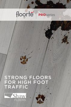 the floor is covered in dirt and has brown spots on it with words stating strong floors for high foot traffic