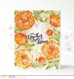 a card with orange flowers on it and the words together are written in black ink