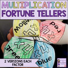 four different colored dices with the words multiplication fortune teller on them