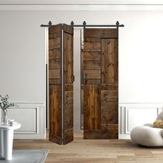 two wooden doors are open in a white room with a chair and rug on the floor