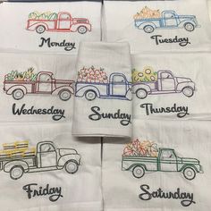 embroidered kitchen towels with trucks on them and the words monday, wednesday, sunday, tuesday