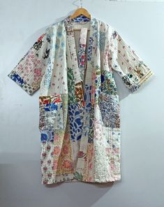 "Indian handmade patch work Block Printed Kantha Kimono , Hand Block Kantha Quilted Kimono Robe , Indian Beach Wear , Nightwear Kimono , Bath Robe , Made Of Cotton Kantha, Quilted Kimono Color : As Per Image Length:30= 40\"=50= Inches *Shoulder: 8\" Inches *Sleeve Length: 14\" Inches *Sleeve hole: 9\" Inches *2 Side Pockets Pattern :- Printed Handmade... For the very reason that each item has been handmade there is always an element of human error, whether it be a missed stitch or overlapping bl Traditional Patchwork Kimono For The Beach, Traditional Patchwork Beach Kimono, Multicolor Embroidered Cotton Kimono, White Cotton Kimono With Floral Embroidery, Embroidered Multicolor Cotton Kimono, Vintage Multicolor Patchwork Kimono, Multicolor Cotton Kimono With Patchwork, Multicolor Cotton Patchwork Kimono, Handmade Multicolor Cotton Kimono