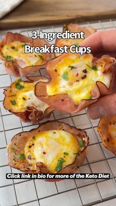 three ingredient breakfast cups with bacon and cheese in them on a cooling rack, ready to be eaten