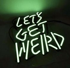 a neon sign that says let's get weird