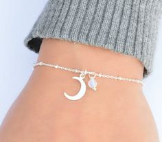 Crescent Moon Bracelet, Sterling Silver Bracelet for Women, Dainty Bracelet, Silver Bead Bracelet, Delicate Chain Bracelet, Bridesmaids Gift This dainty bracelet has a solid sterling silver 925 delicate satelite chain. The charm is also sterling silver 925. There is an extension so it can be adjusted to fit comfortably. There is an option for the type of stone that you would like.I can also customize the size for you, so feel free to message me if you need a custom orde , or if you have any ques Silver Spiritual Bracelets With Moon Phase, Silver Moon-shaped Bracelet For Gifts, Moonstone Bracelet With Moon Charm As Gift, Elegant Silver Bracelets With Moon Phase, Elegant Silver Moon Phase Bracelet, Adjustable Silver Moon Bracelets, Adjustable Silver Moon Bracelet, Adjustable Sterling Silver Moon Phase Bracelet, Sterling Silver Moon Phase Bracelet For Gift