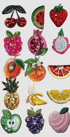 an assortment of fruits and vegetables made out of sequins on a white background