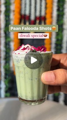 someone holding up a small cup with food in it and the caption reads, paan faloda shots diwali special