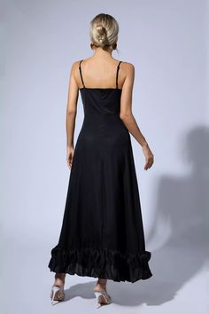 Get ready to turn heads in the stunning Izabella Black A-line Maxi Dress! Crafted from premium, comfortable fabric, this dress is designed to accentuate your curves and hug your body in all the right places. The A-line skirt adds elegance, and the strappy dress adds just the right amount of flirtatiousness. In classic understated black, all you need is pumps and statement earrings for a chic look.  Dress Length: Approx 130cm Materials: Viscose Fiber Gentle Dry Clean Only  Model is 5 ft 7 and wea A-line Ruched Maxi Dress For Evening, Fitted A-line Slip Dress For Cocktail, Elegant Midi Dress With Ruffle Hem And Sweetheart Neckline, Fitted A-line Maxi Dress In Solid Color, Solid A-line Maxi Dress For Evening, Party A-line Maxi Dress With Ruffle Hem, Solid Evening Dress With Ruffle Hem, Chic A-line Lined Maxi Dress, Evening Dress With Ruffle Hem And Sweetheart Neckline