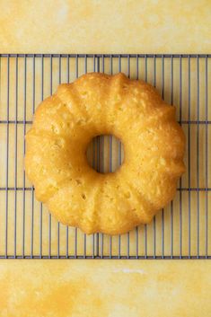 a doughnut sitting on top of a cooling rack