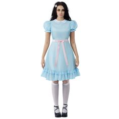 a doll dressed in a blue dress and white tights with pink ribbon around the waist