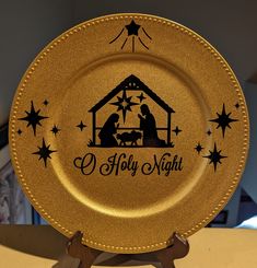 12 x 12 gold acrylic plate with a fine glitter finish and beaded border.  Image and writing is  black vinyl This elegant looking plate will add to any Christmas decor.  Makes a great gift! Plate is decorative only not to be used with food Charger Plates Christmas, O Holy Night, Christmas Nativity Scene, Christmas Plates, Holy Night, Christmas Nativity, Nativity Scene, Black Vinyl, Nativity