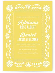 a yellow and white wedding card with an ornate frame on the front, featuring daisies