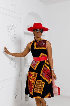 This Zuri African Print High Neck Dress is a sophisticated and stylish addition to your wardrobe. Made from high quality African print fabric, it offers a unique blend of comfort and fashion. The high neck design adds a touch of elegance, making it suitable for both formal and casual occasions.   FEATURES * 100% African Wax Cotton * Back zipper * Dress is Lined with length 43'' * Model Is Wearing A Size Small and Height is 5'9                              CARE INSTRUCTION * Hand Wash in Cold Water. * Do Not Bleach. * Press with Cool Iron on The Wrong Side Kitenge Designs Dresses, Kitenge Dress Designs Unique, Kitenge Dress Designs, Kitenge Dress, Kitenge Designs, African Shoes, Back Zipper Dress, Ankara Fashion, High Neck Designs