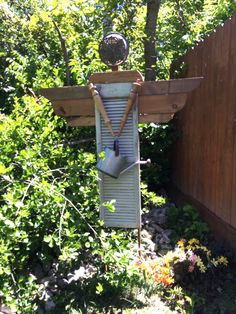 a garden decoration made out of old shutters