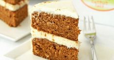 two slices of carrot cake with white frosting