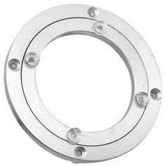 an open metal ring with four screws on the side and two holes in the middle