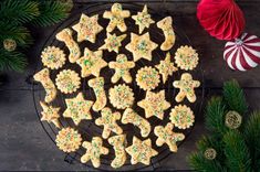 christmas cookies are arranged on a cooling rack