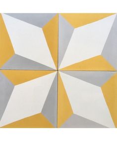 an abstract tile design in yellow, grey and white