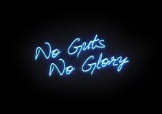 the words no guts, no glory are lit up in blue