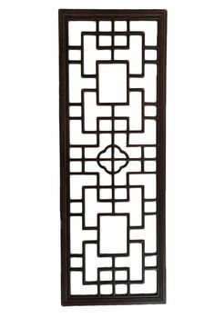 a decorative wall panel with an intricate design on the front and back panels, in dark wood