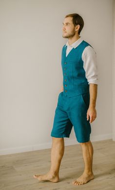 "Our linen vest and shorts suit is handcrafted to fit your individual body measurements. We take pride in the fact that there are no factory processes involved in making our linen clothes for men. Each casual suit is made with care and attention to detail. SIZING After you place your order, I will email you to request your measurements, ensuring a perfect fit for this linen vest and shorts suit. It will be tailored specifically to match your unique body shape. THE PROCESS IS SIMPLE AND EFORTLESS Wedding Suit Boho, Single-breasted Linen Wedding Suits, Semi-formal Linen Suits With Double Button Closure, Linen Clothes For Men, Single-breasted Linen Suits For Tailoring, Blue Single-breasted Linen Suit, Rustic Wedding Attire, Linen Waistcoat, Men’s Linen Shorts