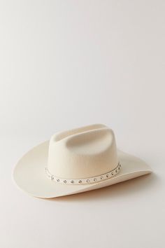 Designed to add a little western-inspired touch to every look, this cool and classic cowboy hat is featured in a staple silhouette with rhinestone detailing at center for the perfect sparkly finish. | Wrangler Sparkle Cowboy Hat at Free People in White White Western Hat, Cream Cowgirl Hat, White Cowgirl Hat With Rhinestones, Luxury Cream Western Cowboy Hat, Cowgirl Hats Western White, Cowboy Hats, Free People, Cowboy