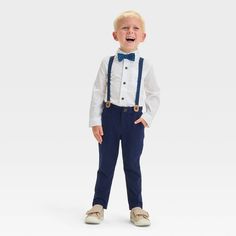 Dress your toddler for a school function or any special occasion with the Long-Sleeve Button-Down Shirt and Suspender Pants Set from Cat & Jack™. This outfit set includes a button-down shirt, pants and suspenders to get them ready for any occasion in classic style. Plus, the suspenders have an adjustable elastic strap with a snap closure to customize the fit. The lightweight poplin fabric keeps them in cool comfort, and the pull-on style ensures ease of wear. Cat & Jack™: Designed for all childr Boy Wedding Guest Outfit, Toddler Suspender Outfit, Blue Wedding Guest Outfits, Toddler Suspenders, School Function, Suspenders Set, Suspender Pants, French Terry Shorts, Navy Blue Wedding