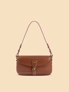 Leather Baguette Flap Bag For Everyday Use, Leather Flap Baguette Bag, Baguette Satchel With Detachable Strap, Trendy Leather Baguette Shoulder Bag, Trendy Leather Baguette Bag, Chic Fall Shoulder Bag With Flap, Brown Baguette Shoulder Bag For Travel, Brown Baguette Shoulder Bag For Everyday Use, Brown Baguette Bag With Detachable Strap