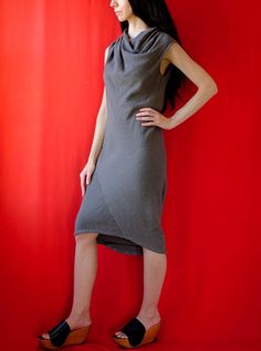 CLOTH POEMS charcoal grey linen crêpe bias-cut draped sheath dress with asymmetric high-low hem, cowl neck & pleated detailing at shoulders.  The fabric is this amazing European woven linen that behaves like a stretch material and has a waffled texture.  It's medium weight, perfect for cool weather.  Dress slips on overhead and has hook & eye closure at back collar. Tagged size extra small.  Dress fits perfectly on a US size 4 dress form mannequin.  Also pictured on a size 2ish model, 5'6" tall (168cm).     Measurements:  bust up to 38" (96cm) waist up to 36" (91cm) hips up to 40"  (101cm) length from front shoulder to hem 40" (101cm) collar circumference is 22" (56cm) when fastened  sleeve opening circumference: 18"  (46cm) hem opening circumference: 39" (99cm) Care:  hand washing & line Dress Form Mannequin, High Low Hem, Dress Measurements, Dress Form, Gray Linen, Cowl Neck, Sheath Dress, Dress Clothes For Women, Slip Dress