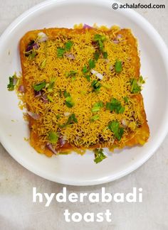 a white plate topped with food on top of a table