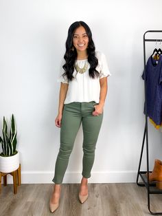 Spring Work Outfit: white ruffle sleeve blouse + olive green khaki pants + nude pointed toe pumps + gold leather earrings + gold bib statement necklace Olive Green Jegging Outfits, Work Outfit Olive Pants, White Olive Green Outfit, Business Casual Olive Pants, Light Green Work Pants Outfit, Green Pants Navy Top Outfit, Green Jegging Outfit, Work Outfits With Green Pants, Olive Green Pants Outfit Work Business Casual