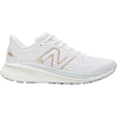 Designed to keep up with the demands of the stability-minded every day runner. The New Balance W860v13 Fresh Foam X is a sporty women's running shoe that is built for reliability over the long haul and sustained comfort over all distances. These New Balance W860W13 Fresh Foam X White/Light Aluminum/Light Gold Mesh Women's Shoes have the following features: Structured and breathable engineered mesh upper Fresh Foam X midsole foam with approximately 3% bio-based content delivers our most cushioned Fresh Foam experience for incredible comfort Bio-based content is made from renewable resources to help reduce our carbon footprint Reflective accents designed to catch the light Internal gusseted tongue for a secure fit 10 mm drop Meets New Balance's green leaf standard: upper is made of 50% or mo Trail Shoes Women, New Balance Fresh Foam, Winter Gear, New Balance Women, Trail Shoes, Womens Running Shoes, Socks For Sale, Running Women, Shoe Sale