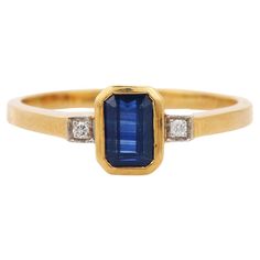 Blue Sapphire ring in 18K Gold which perfectly goes with your personality and also helps you to learning and spiritual healing. Designed with Blue Sapphire in center and diamonds at sides that makes it a perfect fit to wear it on your wedding or style it with any of your basic outfit to give it a glam. PRODUCT DETAILS :- > Material - 18K Solid Yellow Gold > Gemstone - Blue Sapphire > Gemstone Weight - 0.67 ct > Stone Shape - Octagon > Stone Size - 6*4 mm > Diamond Weight - 0.02 ct > Gross Weight - 2.978 Grm > Shank width - 1.6 mm > Setting - Bezel setting We can customize the Gold Gemstone Ring according to your specification. Go to our Storefront Page for more updates and click on the follow button to never miss out on our newly added jewelry collection. All our jewelry products are stamp Yellow Gold Cocktail Ring, Gold Sapphire Ring, Diamond Cocktail Ring, Gold For Sale, Blue Sapphire Ring, Gold Gemstone Ring, Gold Cocktail, Blue Sapphire Diamond, Diamond Cocktail Rings