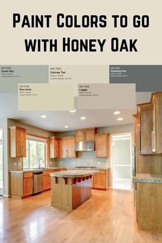 an open kitchen with wooden cabinets and wood flooring is featured in the article paint colors to go with honey oak