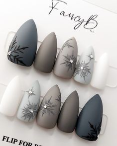 A stunning gray scale press on nail set to show off your winter style this season. In an alluring, soft matte finish with snowflakes and black diamonds for added elegance you'll be sure to get noticed! XS: 14/11/12/10/8 S: 15/12/13/11/8 M: 16/12/13/11/9 L: 17/13/14/12/10 Custom: Type in personalization note. NAIL SET INFO: - All nail sets come with an application kit which include: Glue, adhesive tabs, nail file, alcohol wipes, & cuticle stick. - All nail sets are reusable when removed with care Grey Christmas Nails, Nails With Charms, Winter Nail Colors, Gray Scale, Nail Colors Winter, Snowflake Nails, Gel Tips, Winter Nail Art, Winter Nail