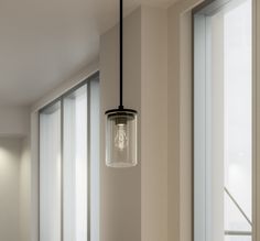 The 1 light Crosby mini pendant with Black finish and clear glass uses 100 watt (max.) bulb equivalent. It measures 6" in width and 10.75" body height. For maximum versatility, it comes with 68" of extra lead wire for customizable length and height and has a 90 degree stem tilt. Cleaning instructions: turn off electric current before cleaning. Clean metal components with a soft cloth moistened with a mild liquid soap solution. Wipe clean and buff with a very soft dry cloth. Under no circumstance Cylinder Pendant Light, Clean Metal, Hanging Pendant Light, Glass Cylinder, How To Clean Metal, Black Pendant Light, Black Pendant, Hanging Pendant, Hanging Pendant Lights