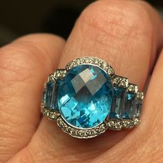 14kwhite Gold And Swiss Blue Topaz Waterfall Ring With Diamond Accents...Checkerboard Cut On Middle Stone.. Baguette Cuts On Side Stones.. In Pristine Condition Size 6.. Stunning Ring Pictures Do Not Do It Justice Inthe Light Stones Look Like They Are On Fire!!! Beautiful Color!!! Topaz Is 7.20 Ct And Diamonds Are .21ctw Fire Beautiful, Ring With Diamond, Ring Pictures, Ring Color, Tourmaline Ring, Swiss Blue Topaz, Blue Jewelry, Girly Jewelry, On Fire