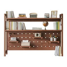 a wooden shelf with books, pictures and other items on it in front of a white background