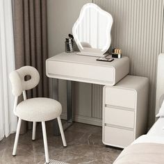 a bedroom with a white vanity table and chair next to a mirror on the wall