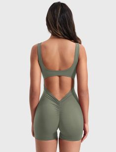 Our Lizvette V-Back Romper combines style and comfort with its striking design. The deep V and hip-lifting ruching enhance your curves, while its anti-sag, stretchy fabric ensures a perfect fit all day. A must-have for effortless elegance!   Feature    U-shaped wide neckline and open back   Deep V at the hips and hip-lifting scrunching design   Removable cup pads   Anti-sagging, compression yet stretchy   Double-sided fleece fabric   4.5-inch inseam    Fabric    75% Nylon + 25% Spandex    Model Fitted Athleisure Activewear With Ruched Sides, Fitted Versatile Activewear, Versatile Fitted Elastane Activewear, Athleisure Activewear With Ruched Sides And Stretch, Stretch Athleisure Activewear With Ruched Sides, Fitted Activewear With Built-in Padding, Fitted Casual Activewear With Built-in Padding, Casual Activewear With Built-in Padding, Fitted Shapewear Activewear For Yoga