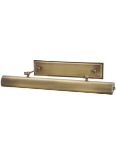 an antique brass finish bathroom light fixture