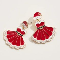 Get in the holiday spirit with our Santa Girl Drop Earrings! These festive red earrings are the perfect accessory to complete your Christmas look. Spread joy and cheer with these holiday-inspired drop earrings. Add them to your jewelry collection today! 1 1/4" Drop, 1 1/2" Width Santa Girl, Christmas Look, Boutique Trends, University Of South Carolina, Holiday Earrings, University Of Arkansas, University Of Oklahoma, Holiday Earring, Red Earrings