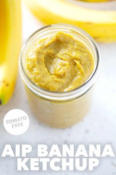 a banana ketchup in a jar next to bananas