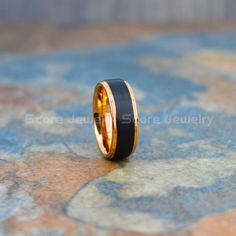 two tone gold and black wedding band ring