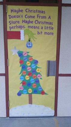 a bulletin board with a christmas tree on it's front door that says maybe christmas doesn't come from a store maybe maybe perhapss a little bit more