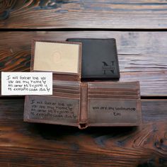 three leather wallets with note attached to them