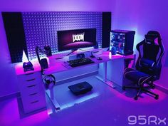 a gaming room with purple lighting and a computer desk