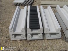 several different types of concrete blocks laying on the ground